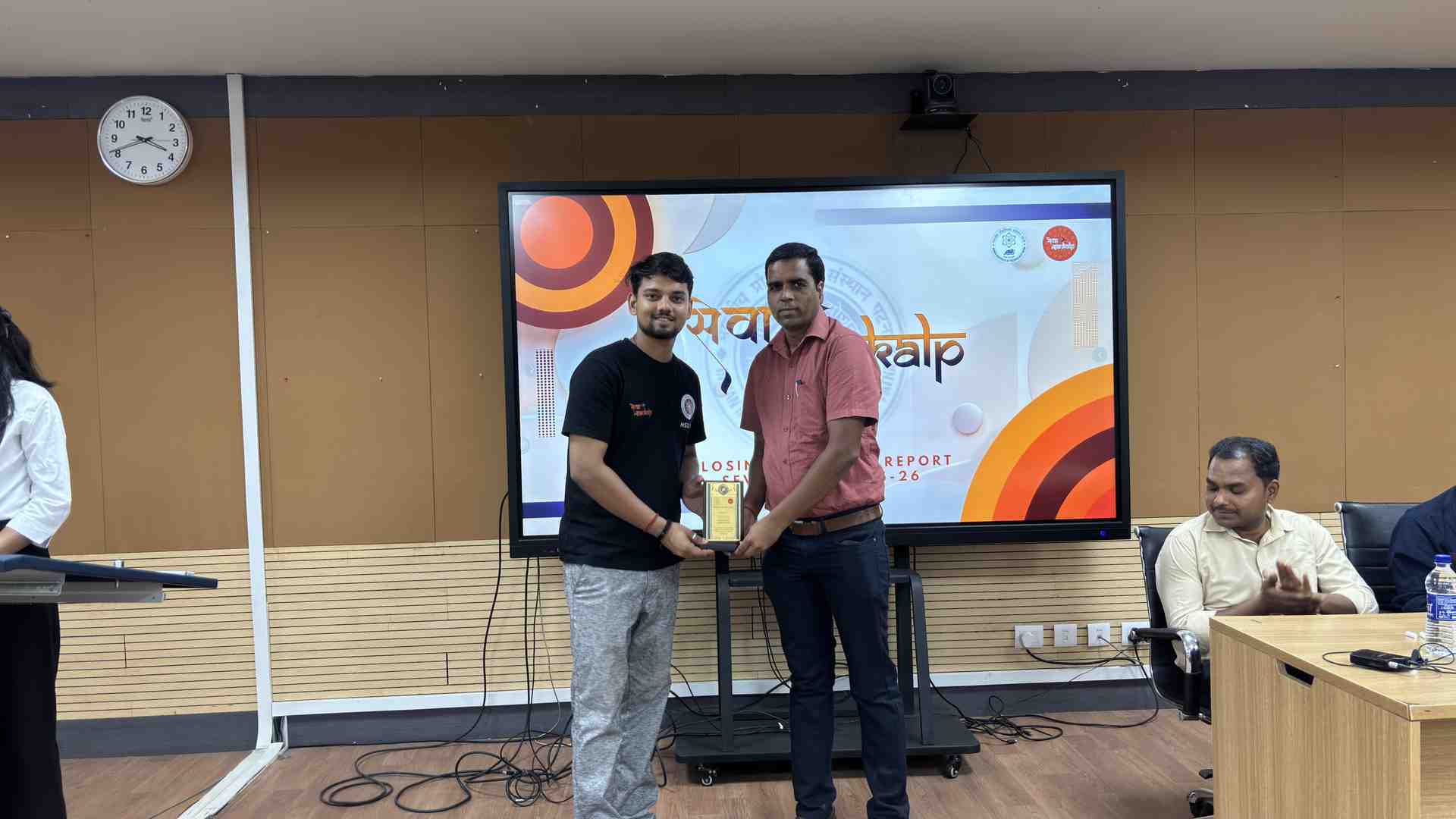 Wing Coordinator receiving the Award of Excellence